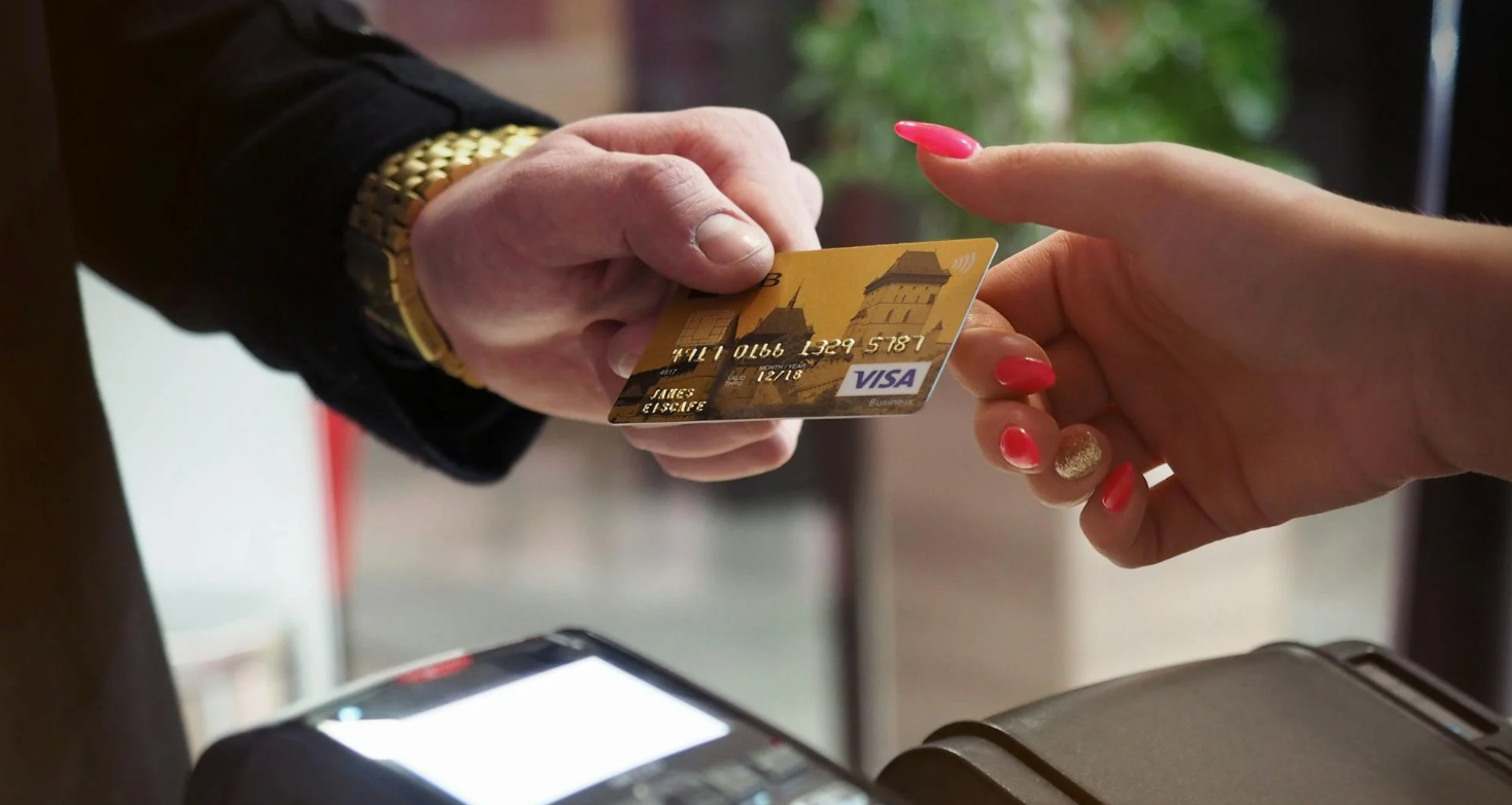 Person putting a down payment on a vehicle